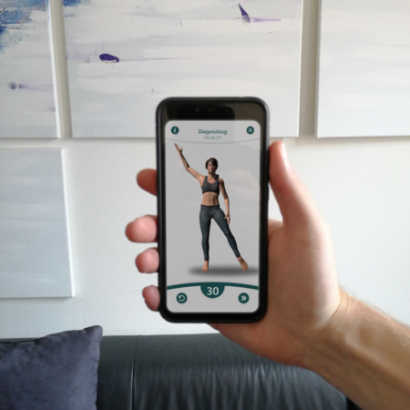 Hand mit Handy - verspiegelt